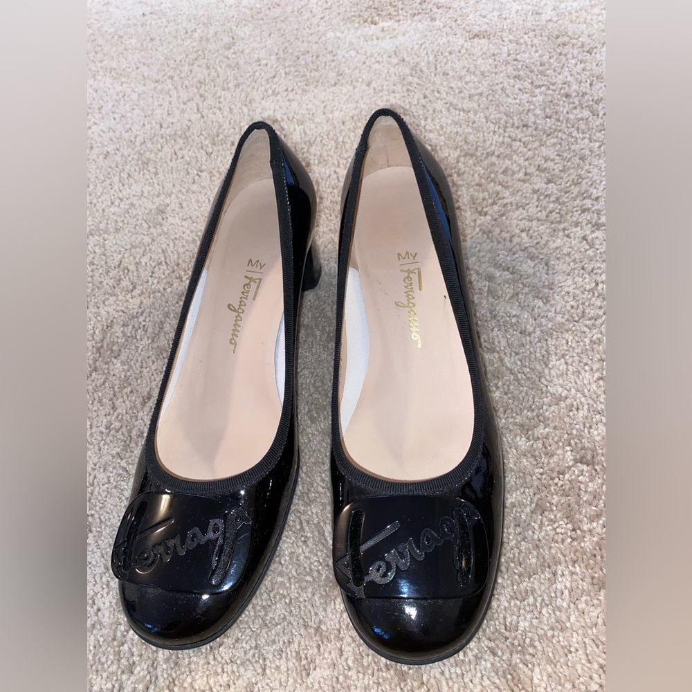 Size 7.5 Ferragamo Heels. Solid black with black logo on toe. Gently worn.